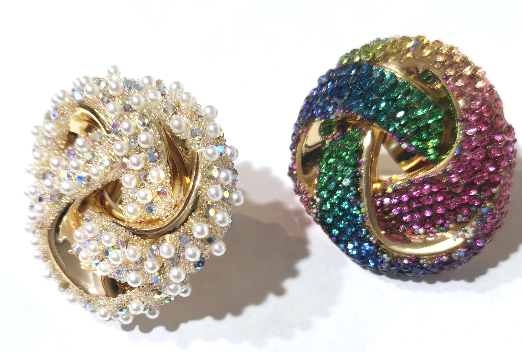 Pearl and rainbow crystal knot statement earrings